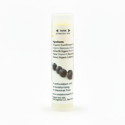 Made from Earth Blueberry Lip Balm tube close-up showing natural lip care product