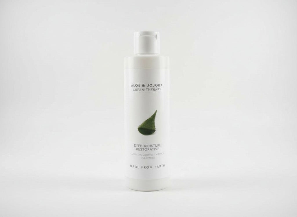 Made from Earth Aloe & Jojoba Cream Therapy Deep Moisture Restorative lotion bottle with aloe leaf graphic.