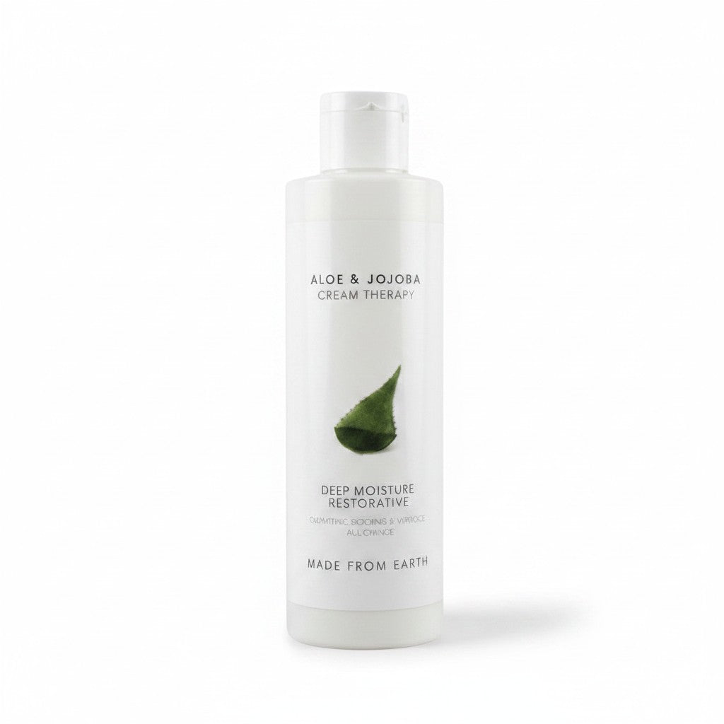 Made from Earth Aloe & Jojoba Cream Therapy in an 8 oz white bottle for face and body skin hydration.