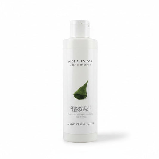 Made from Earth Aloe & Jojoba Cream Therapy in an 8 oz white bottle for face and body skin hydration.