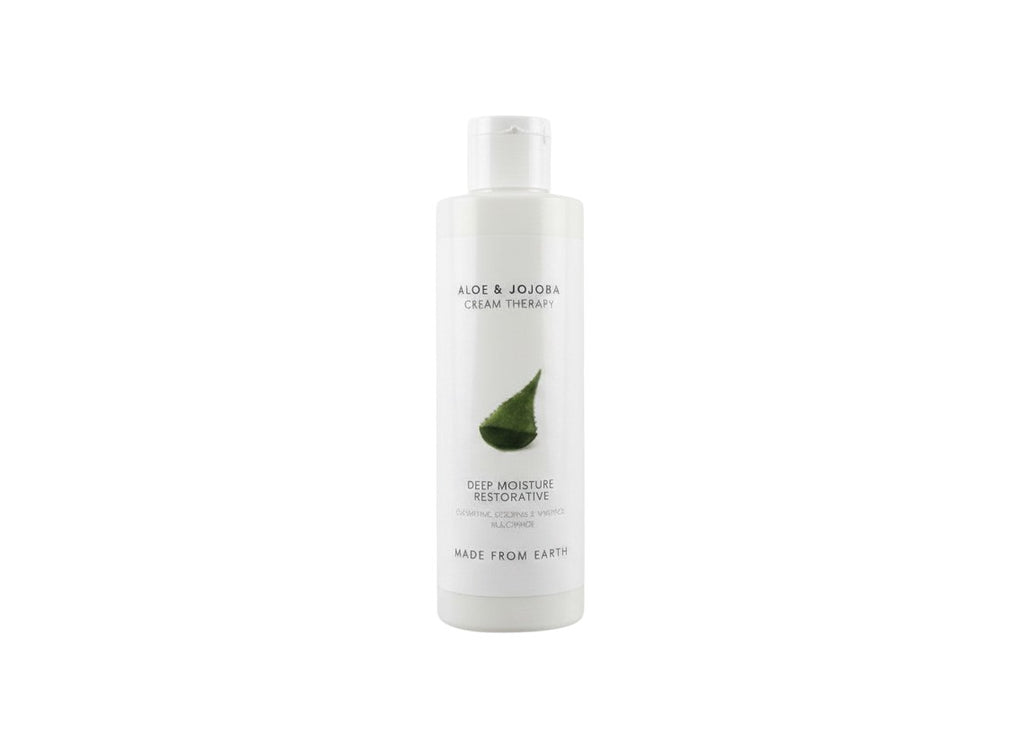 Made from Earth Aloe & Jojoba Cream Therapy Deep Moisture Restorative lotion in a white bottle with green aloe leaf graphic.