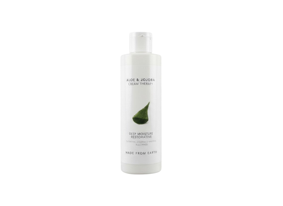 Made from Earth Aloe & Jojoba Cream Therapy Deep Moisture Restorative lotion in a white bottle with green aloe leaf graphic.
